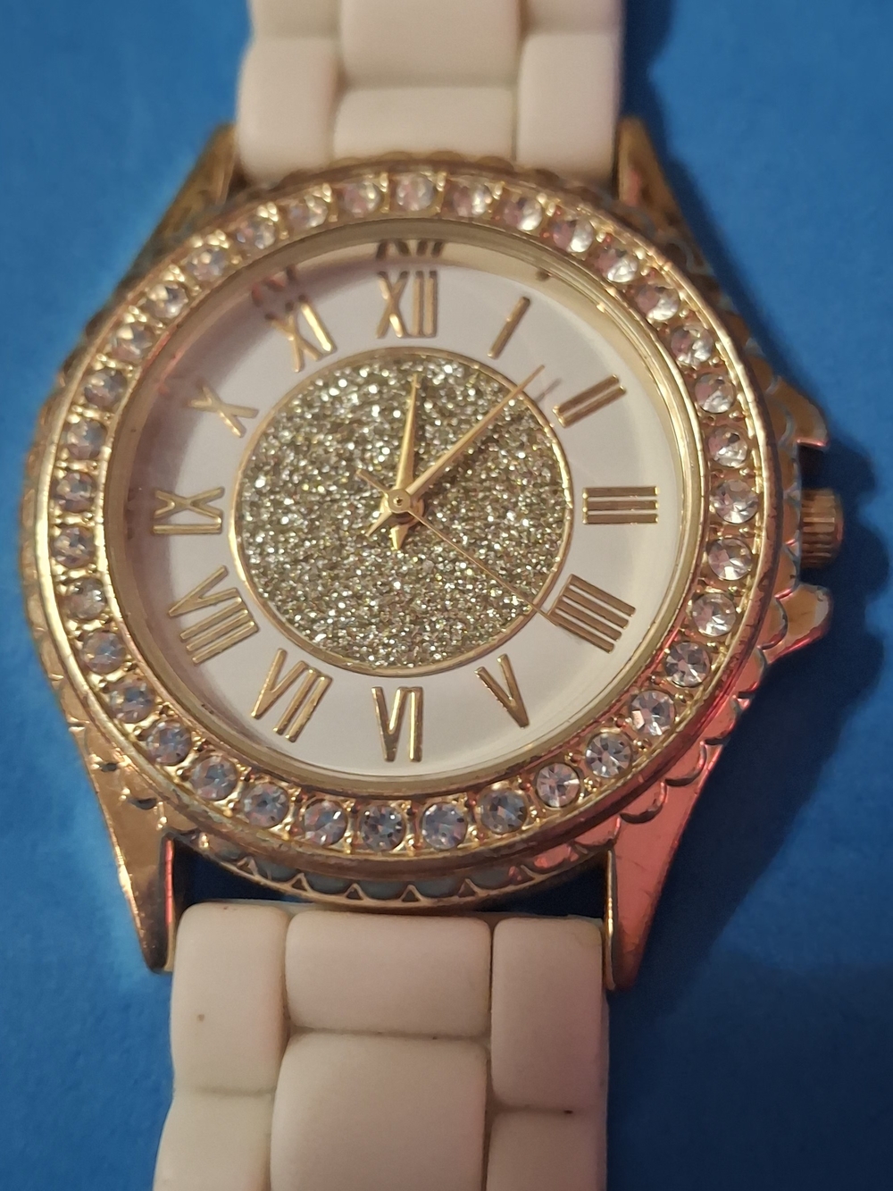 Source Unknown Gold-Tone Watch with White Band and Crystal Accents